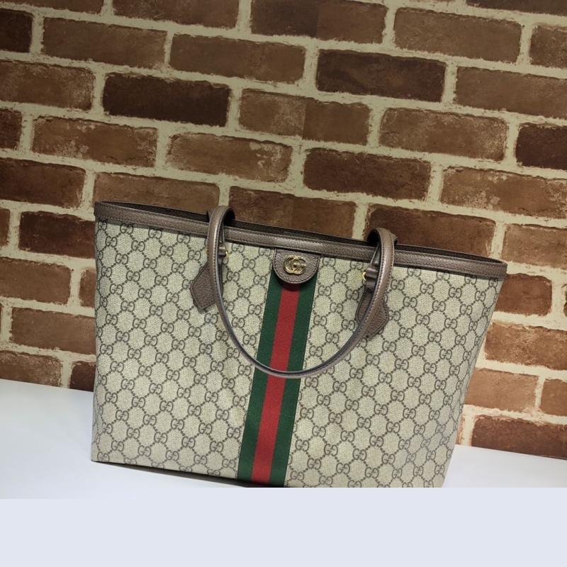 G*u*i shopping bags